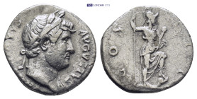 Hadrian AD 117-138. Rome Denarius (2.86 Gr. 17mm.)
Laureate bust right, drapery on left shoulder 
Rev. Roma standing right, foot on helmet, holding sp...
