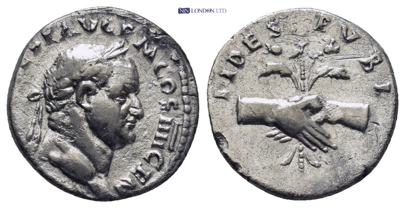 Vespasian. 69-79 AD. Denarius. (2.88 Gr. 18mm.)
Head laureate right.
 Rev. Clasp...