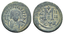 Maurice Tiberius AD 582-602. Cyzicus Follis Æ (27mm., 11,3 g. D N mAVRICI TIbER P P A, helmeted and cuirassed bust facing, holding globus cruciger and...