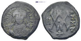 MAURICE TIBERIUS.582-602 AD.Antioch. AE Half Follis (7.3 Gr. 22mm.)
Bust facing, wearing crown with trefoil ornament, and consular robes; in right han...