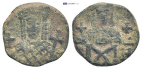 CONSTANTINE VI and IRENE 780-797 AD. AE Follis Constantinople (3.14 Gr. 17mm.)
 Crowned facing bust of Irene, holding globus cruciger and sceptre 
Rev...