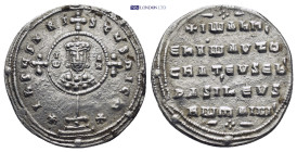 John I, 969-976 AD. AR Miliaresion Constantinople. (3.22 Gr. 23mm.)
Small crowned bust within circle 
Rev. Legend, crosses of 5 pellets.
