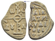 Byzantine Lead Seal (10.46 Gr. 29mm.). Obv: Cruciform monogram Rev: Legends in four lines.