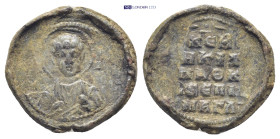 Byzantine Lead Seal (6.6 Gr. 22mm.). Obv: Bust of a Saint Rev: Legends in five lines.