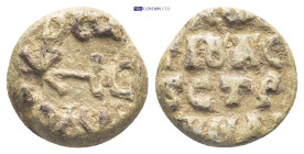 Byzantine Lead Seal (8.44 Gr. 17mm.). Obv: Cruciform monogram Rev: Legends in four lines.