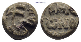 Byzantine Lead Seal (4.94 Gr. 12mm.). Obv: Cruciform monogram Rev: Legends in two lines.