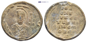 Byzantine Lead Seal (7,37 Gr. 24mm.). Obv: Bust of a Saint Rev: Legends in six lines.