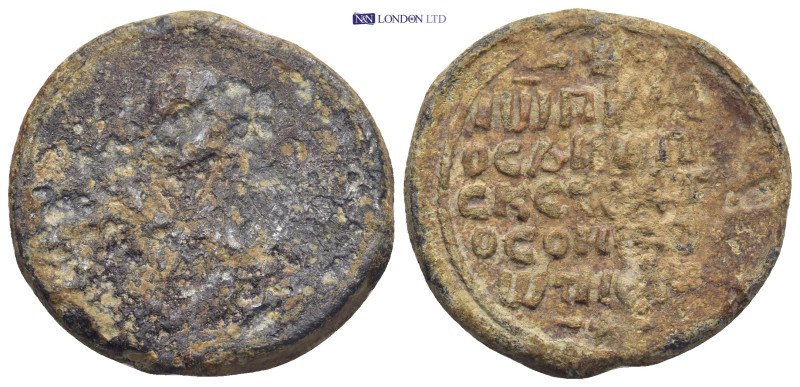 Byzantine Lead Seal (18.2 Gr. 29mm.). Obv: Rev: Legends in five lines.