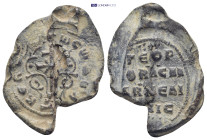 Byzantine Lead Seal (7.0 Gr. 29mm.). Obv: Large patriarchal cross on steps, with floral ornaments springing from the base Rev: Legends in four lines.
