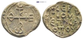 Byzantine Lead Seal (12.2 Gr. 24mm.). Obv: Cruciform monogram Rev: Legends in four lines.