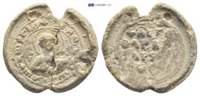 Byzantine Lead Seal (6.4 Gr. 22mm.). Obv: Nimbate facing bust of Saint, holding a spear over his left shoulder, and resting a shield on his left arm ....