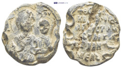 Byzantine Lead Seal (13.75 Gr. 26mm.). Obv: Half-length of the Mother of God holding the Child in her left arm Rev: Legends in six lines.