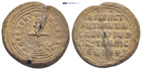 BYZANTINE SEALS., Circa 10th century. (18.5 Gr. 27mm.) 
A patriarchal cross mounted on a base of three steps. 
Rev. Five metric lines