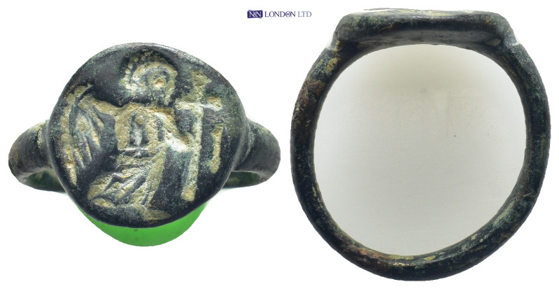 Byzantine bronze ring with Victory holding long cross. (22mm, 7.9 g)