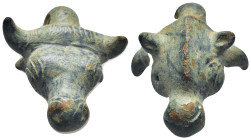 Bronze bull's head appliqué. (35mm, 37.1 g)
