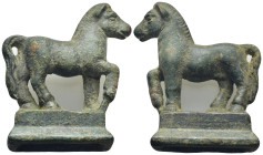 Bronze figure of an advancing horse with foreleg raised on a socle base with short splayed legs (48mm, 63.6 g)