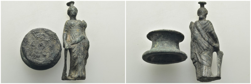 Bronze Tyche figure with base. Robed, with a cornucopia in her left hand and a s...