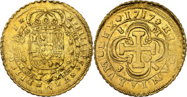 1717. Felipe V. Sevilla. M. 8 escudos. (AC. 2289) (Cal.Onza 507). Tipo "Cruz". 8-M / S-8. Algo descentrada. Acuñación floja. Bella. Moneda exenta del ...