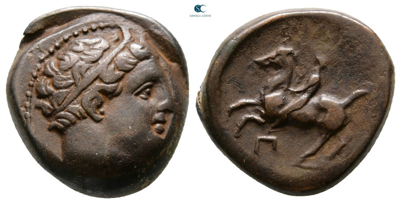 Kings of Macedon. Uncertain mint. Philip II of Macedon 359-336 BC. 
Bronze Æ
...