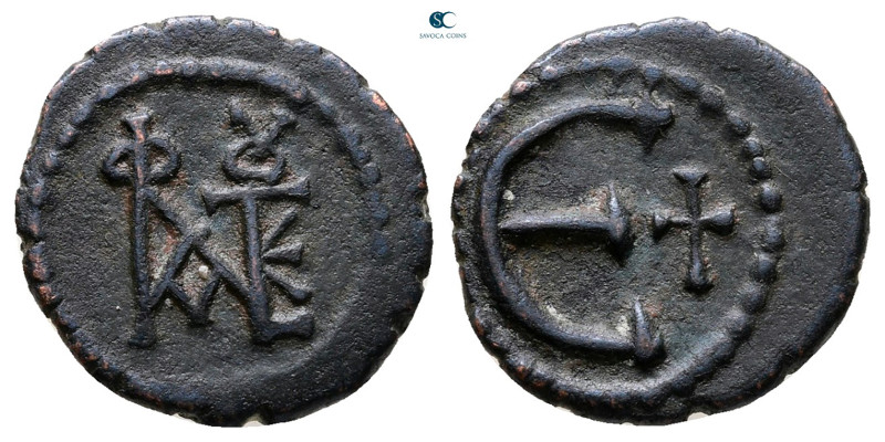 Justin II AD 565-578. Theoupolis (Antioch)
Pentanummium Æ

15 mm, 1,71 g

...