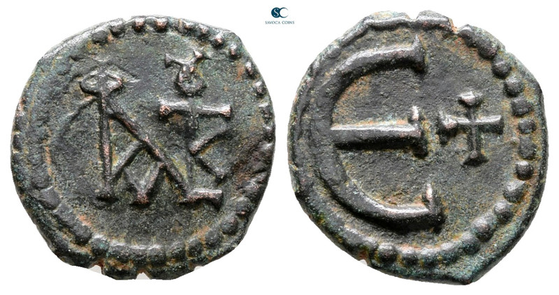 Justin II AD 565-578. Theoupolis (Antioch)
Pentanummium Æ

16 mm, 1,91 g

...