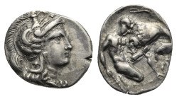 CALABRIA. Tarentum. Circa 325-280 BC. Diobol (Silver, 12.63 mm, 1.14 g). Head of Athena to right, wearing crested Attic helmet decorated with Skylla; ...