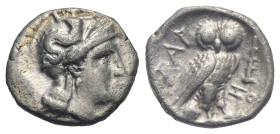 CALABRIA. Tarentum. Circa 281-276 BC. Drachm (Silver, 16.29 mm, 3.17 g). Head of Athena right, wearing crested Attic helmet adorned with Skylla. Rev. ...
