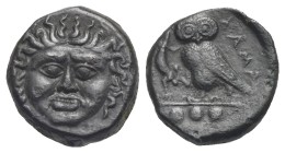 SICILY. Kamarina. 420-405 BC. Bronze (Bronze, 14.90 mm, 3,50 g). Facing gorgoneion. Rev. Owl standing to left, head facing, holding lizard in talons; ...