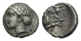 EUBOEA. Euboean League. Circa 304-290 BC. Obol (Silver, 9.08 mm, 0.69 g). Head of nymph Euboea left. Rev. Head and neck of filleted cow right. BMC -. ...