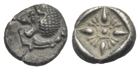 IONIA. Miletos. Circa 525-475 BC. Obol (Silver, 9.58 mm, 1.02 g). Forepart of lion right, head turned back. Rev. Stellate design within square incuse....