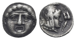 PISIDIA. Selge. Circa 350-300 BC. Obol (Silver, 9.91 mm, 1.07 g). Facing gorgoneion with protruding tongue. Rev. Head of Athena to right, wearing cres...
