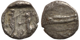 Greek Silver coin

8mm 0,54g