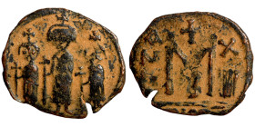 Arab-Byzantine. Umayyad Caliphate, circa 685-705 AD. Fals (bronze, 3.67 g, 25 mm), Baalbek (Heliopolis). Two imperial standing figures, each holding c...