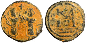 Arab-Byzantine. Umayyad Caliphate, circa 685-705 AD. Fals (bronze, 2.83 g, 19 mm), Baalbek (Heliopolis). Two imperial standing figures, each holding c...