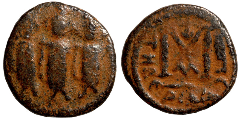 Arab-Byzantine. Umayyad Caliphate, circa 685-705 AD. Fals (bronze, 2.73 g, 16 mm...