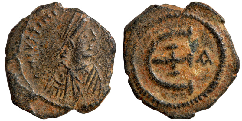 Byzantinine coin Artifically patinated

17mm 2,09g