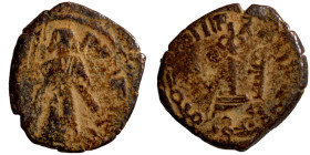 Islamic coin Artifically patinated

19mm 3,07g