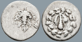 IONIA. Ephesos. (Circa 150-140 BC)
AR Cistophoric Drachm (17.4mm 2.89g)
Obv: Lion skin draped over upright club within wreath
Rev: Grape bunch on l...