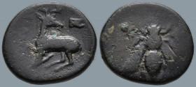 IONIA. Ephesos. (Circa 390-300 BC).
AE Bronze (13.5mm 2.02g)
Obv: Ε – Φ. Bee.
Rev: Stag kneeling to left, head right; astragalos above
BMC 58-66 v...