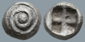 ASIA MINOR. Uncertain mint (probably Caria). (6th century BC)
AR Hemiobol (5.9mm 0.28g)
Obv: Spiral pattern.(human eye).
Rev: Quadripartite incuse ...