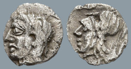 ASIA MINOR. Uncertain. (5th-4th centuries BC).
AR Tetartemorion (6mm 0.13g)
Obv: Head of Apollo left, wearing taenia.
Rev: Helmeted head of Athena ...