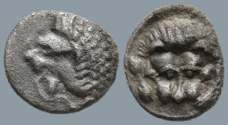 CARIA. Uncertain. (Circa 5th century BC).
AR Obol (7.5mm 0.52g)
Obv: Forepart of a roaring lion left.
Rev: Facing panther's head within incuse squa...