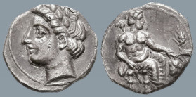 CILICIA. Uncertain. (4th century BC)
AR Obol (10.2mm 0.75g)
Obv: Laureate head of Apollo(?) left
Rev: Baaltars seated right, holding lotus-tipped s...