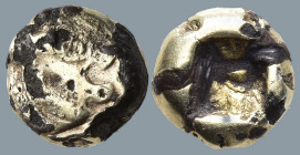 IONIA. Uncertain. (Circa 600-550 BC)
EL Fourrèe Hemihekte (7.6mm 0.76g)
Obv: Forepart of lion right
Rev: Incuse square.