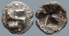 IONIA. Uncertain. (Circa 625-600 BC)
AR 1/24 Stater (8.4mm 0.56g).
Obv: Raised swastika pattern surrounded by pellets and pellet in center.
Rev: Qu...