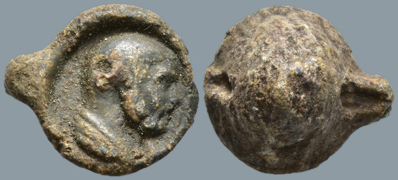 Roman Lead Seal
(10.33g 13.1mm diameter)