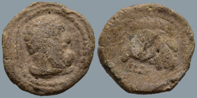 PB Tessera
Obv: Head of bearded Heracles to right, lion skin tied around his ne...