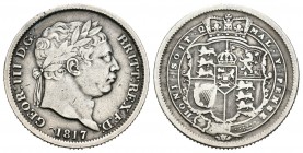Gran Bretaña. George III. 1 shilling. 1817. (Km-666). Ag. 5,45 g. Canto estriado. BC+. Est...100,00.