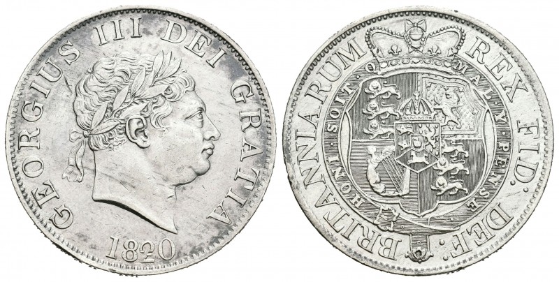 Gran Bretaña. George III. 1/2 corona. 1820. (Km-672). Ag. 14,07 g. Ligeramente l...