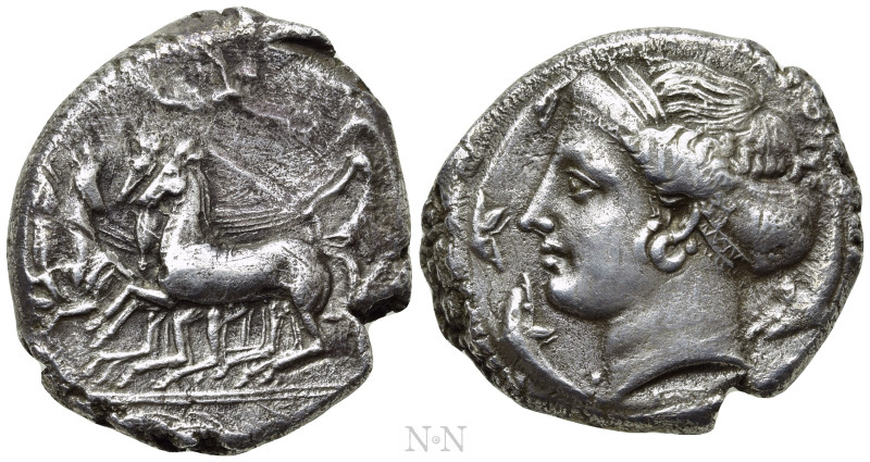 SICILY. Syracuse. Dionysios I (405-367 BC). Tetradrachm. 

Obv: Charioteer dri...